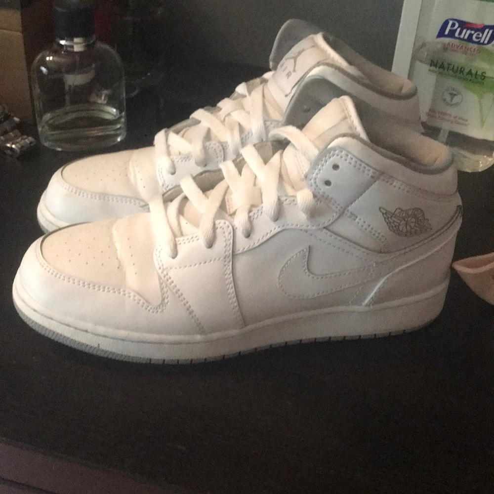 Size 6 (boys) hightop white nike uptown’s .